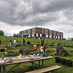 Students doing plantations in a garden for Earth Day